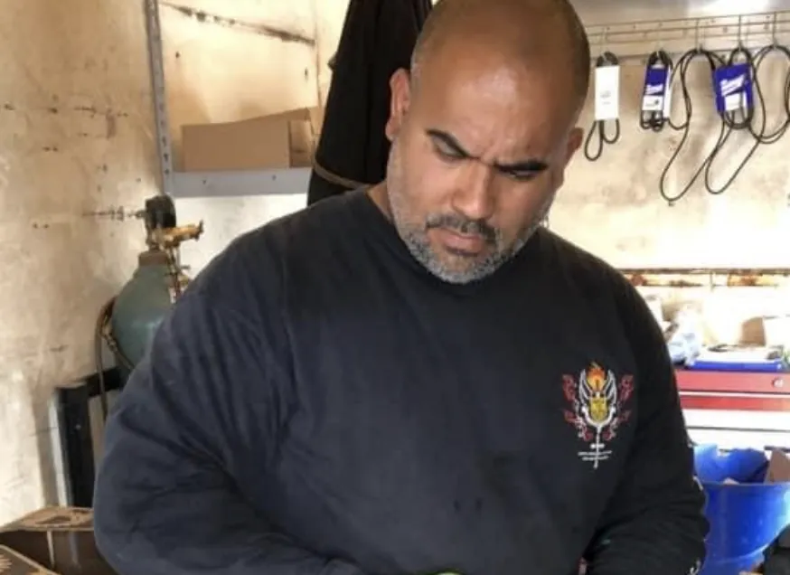 Reefer technician preparing parts in the training workshop